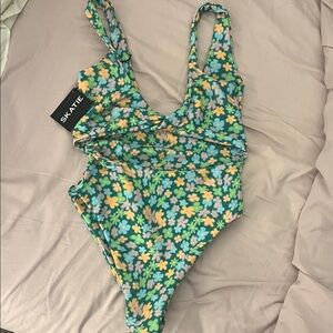 Skatie twisted front cut out Floral One-Piece Swimsuit